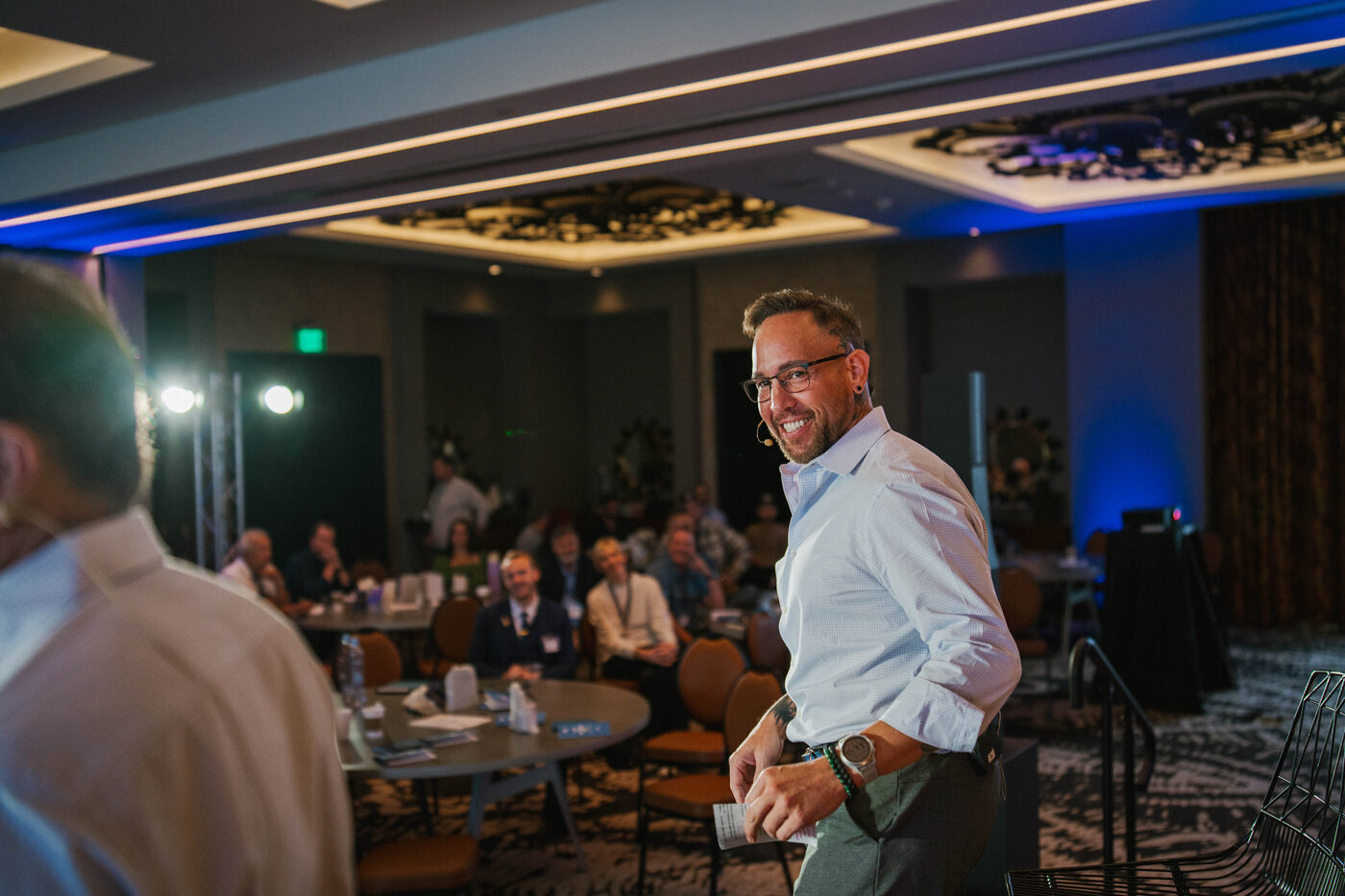 Garrett McClure speaking to the room at DealCon